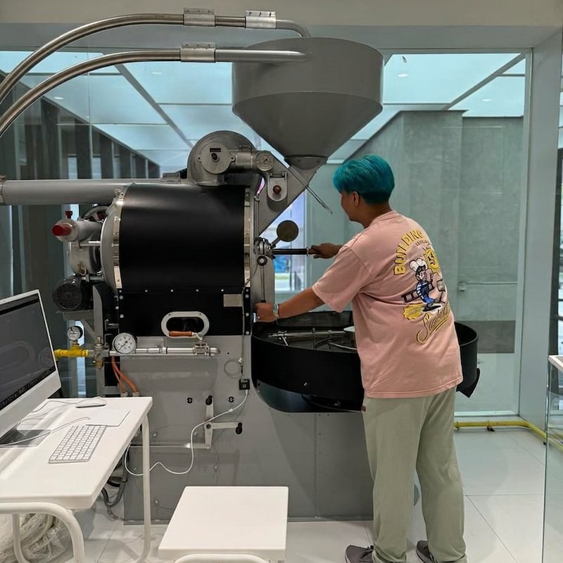 JJ at the roaster developing a profile